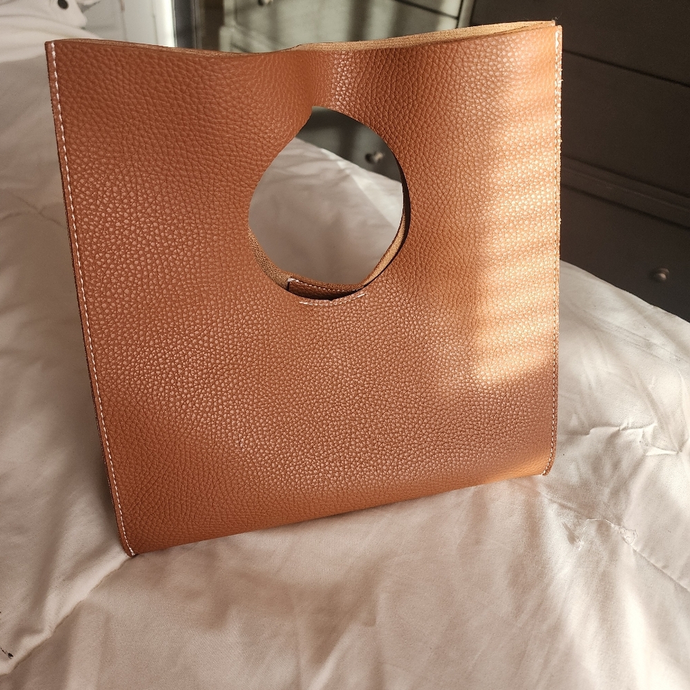 Charming wrist purse